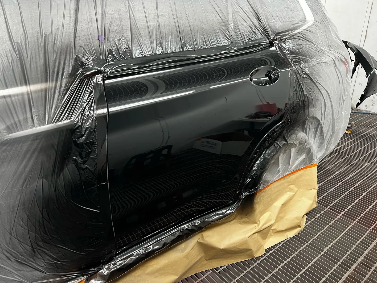 Black rear door refinished with surrounding panels masked
